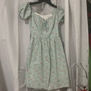 Hand made .Floral puff sleeved short dress size small. Fully lined